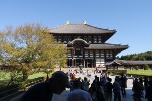The shrine's super-tall wooden building that contains the tall Buddha and several other pieces.