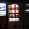 The hypnotizing glow of vending machines. To the right, one that will vend you some beer.