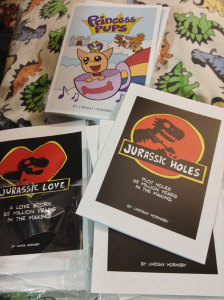 Some of the comics we'll have, including the brand-new Jurassic Holes!