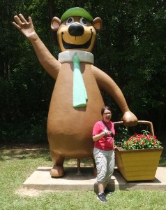 Yogi made sure to have a tight grip on his basket, even though the flowers don't look super edible.